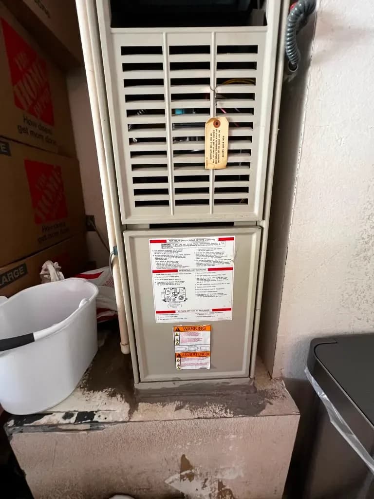 Gas furnace unit installed in home utility closet